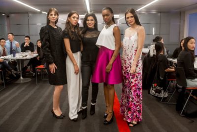 Veronica Apsan (center), an FIT Fashion Design student, with models showing four looks by Cindy, who had the opportunity to design a small collection through Make-A-Wish Metro New York
