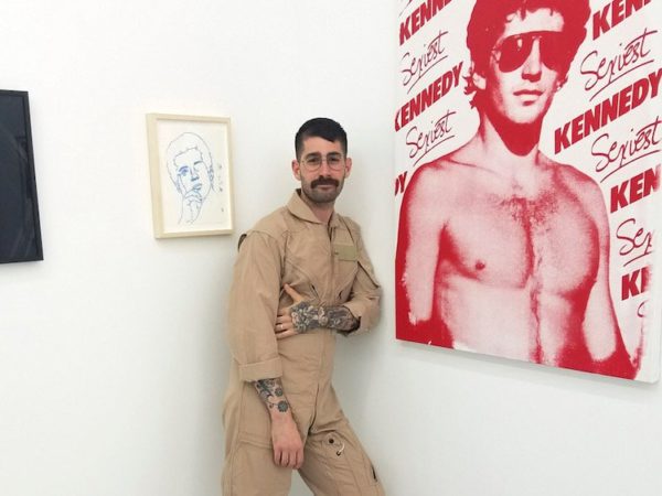 Pacifico Silano standing among his works at Rubber Factory gallery