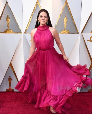 Transgender actress Daniela Vega, styled by FIT alumnus William Graper, poses on the red carpet at the 2018 Academy Awards. 