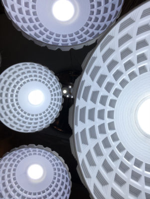 Image of Knoops' artwork Oculi, white half circles with LED lights, a view from underneath