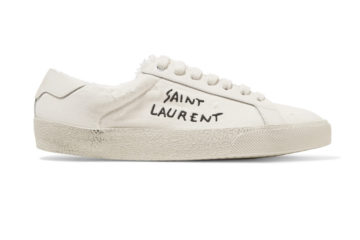 White Yves Saint Laurent sneakers with 'Saint Laurent' handwritten on side