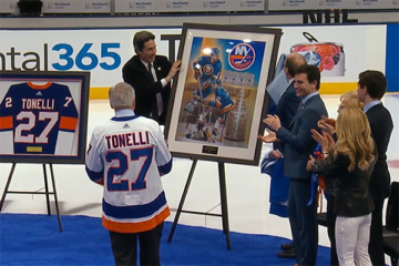 Tonelli at the unveiling of Tony Capparelli's illustration