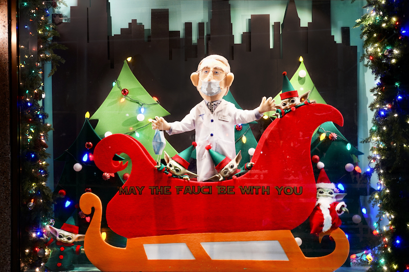 Dr. Fauci muppet in red sleigh