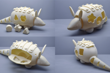 Four images of an unpainted armadillo toy prototype