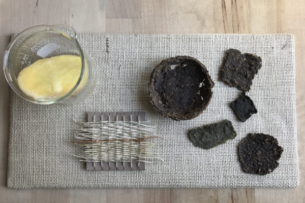 earthy-looking materials on a gray placemat