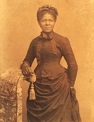 1875 photo of black woman dressed in formalwear