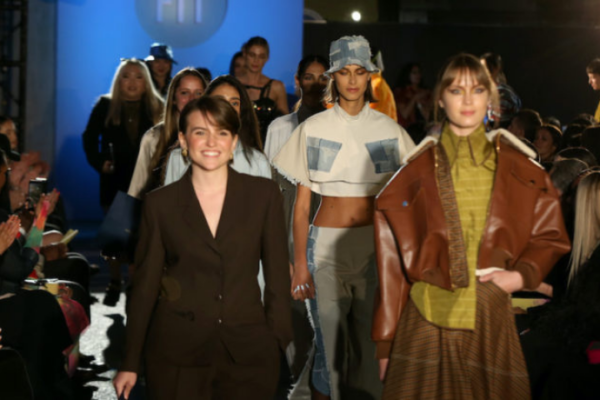 models walking down FIT's Future of Fashion runway