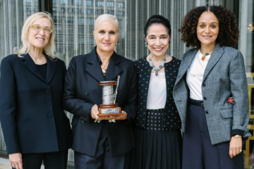 Valerie Steele, Maria Grazia Chirui holding her award, Dr. Joyce Brown, and Samira Nasr
