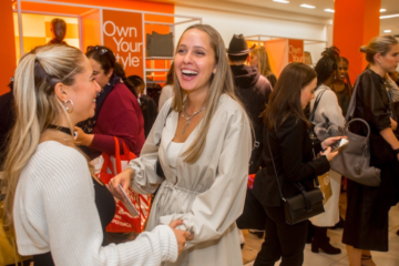 Francesca Bornancini at Macy's standing with well-wishers at opening event