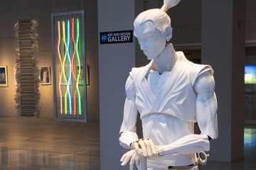 life-size anime sculpture in gallery