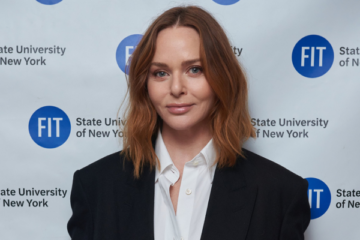 Stella McCartney standing in front of FIT step and repeat