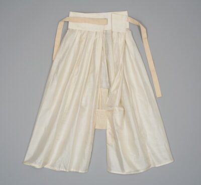 white wide leg pants with a fabric tie