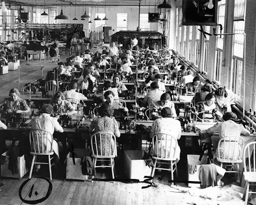 black and white image of garment workers circa 1940s.
