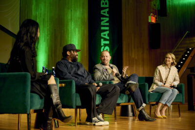 Professor Christina Lee, seated at left, speaks with "Voices of Circularity" panelists Maxwell Osborne, Jason Cohen, and Indré Rockefeller at FIT's Sustainability Conference.