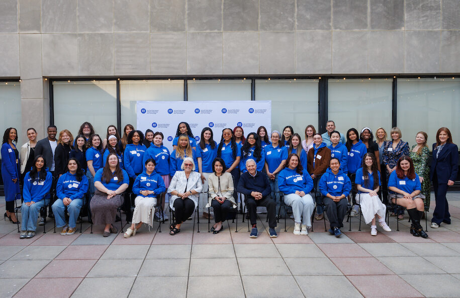 Baker Scholars, Baker Scholar Alumni, Dr. Joyce F. Brown, and Jay and Patty Baker pose for a photo on the patio of the FIT Dubinsky Center