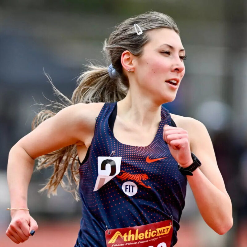 Kimiko Quayle mid stride in her FIT Athletics uniform