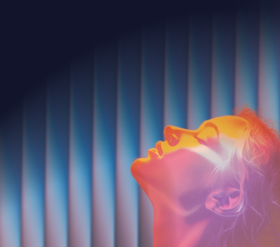 pink silhouette of woman's face against a blue background
