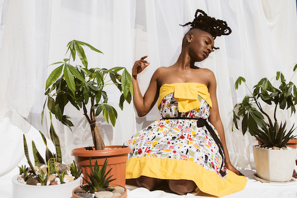 Belania Daley wearing a dress from her BCD collection