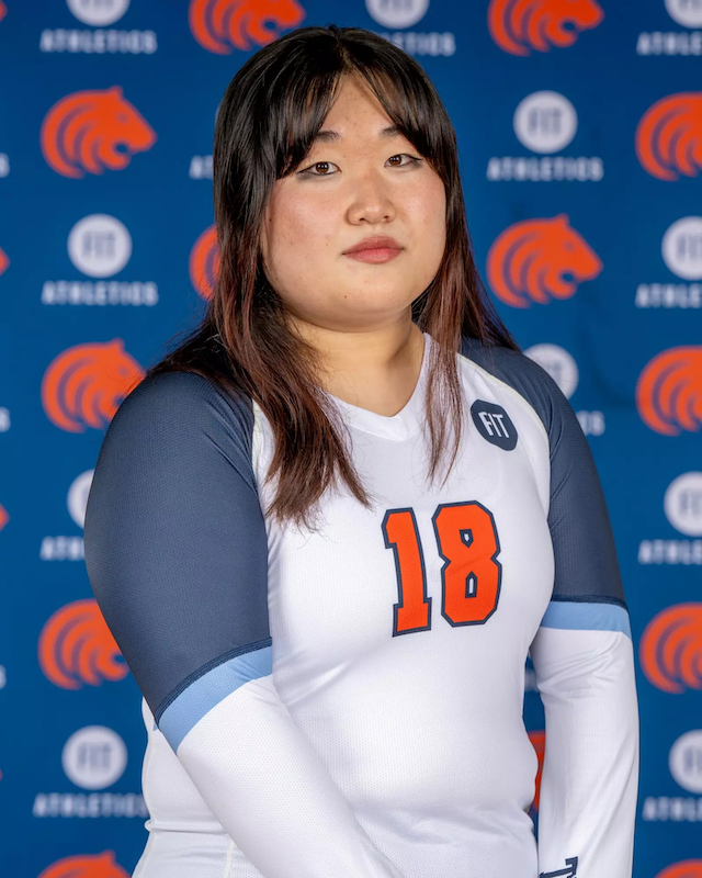 Juun Shin in her FIT volleyball uniform