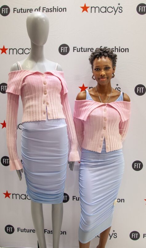 Khoboso Nale stands with a mannequin wearing garments from her Macy's capsule collection 