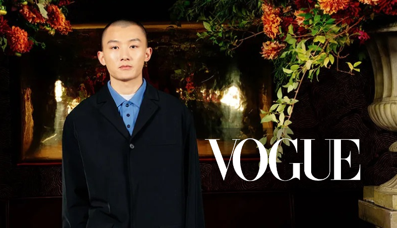 Zane Li stands among potted plants; Vogue logo